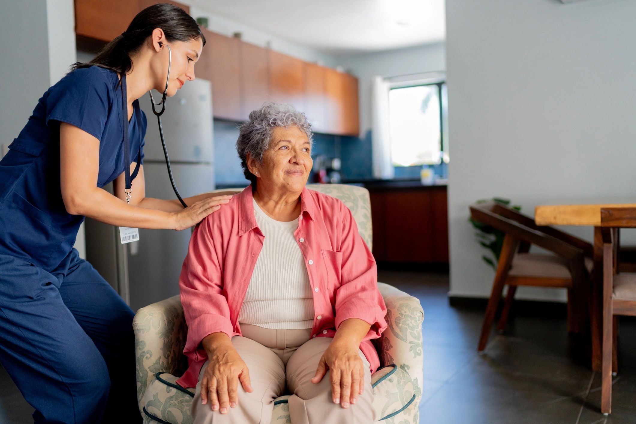 Home care nurse coordinating with patient